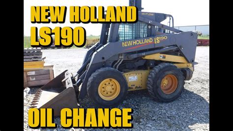 how to change attachments on a new holland skid steer|new holland workmaster 75 attachments.